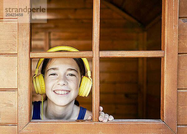 portrait of a beautiful smiling girl looking at the camera