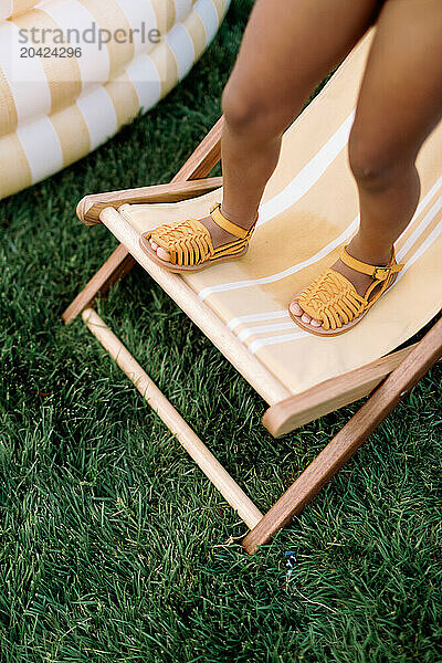 Yellow Huarache Sandals on Summer Loungchair