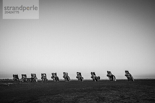 Black and white image of Cadillac Ranch near Amarillo  Texas