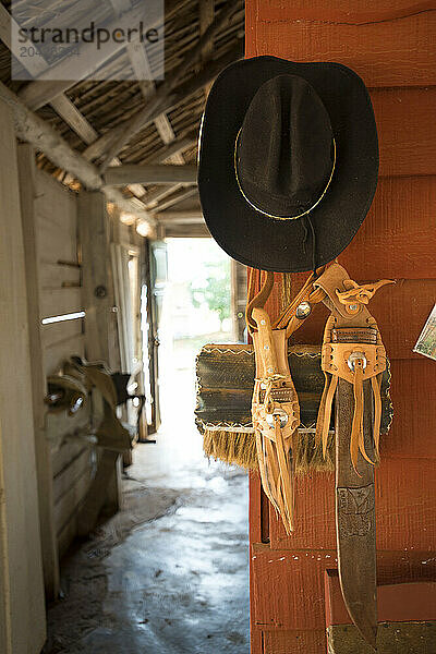 A cowboy hat hangs in ViÃ±ales  Cuba.