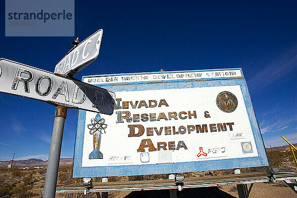 Old rusted and worn signage still stands the test of time to where you are  the Nevada Test Site.