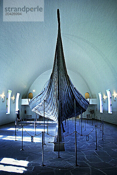 An old Viking ship is on display at the Viking Ship Museum  or Vikingskipshuset  in Oslo  Norway.