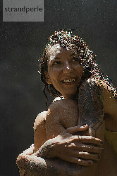 Woman traveler at the waterfall Nung Nung.