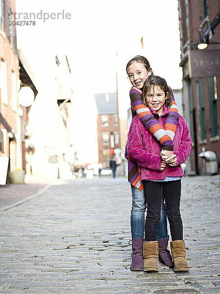 two girls in portland  me's old port