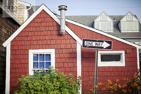 Small red building on one way road in Rockport  Massachusetts.