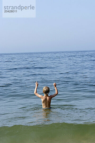 boy looks out to sea