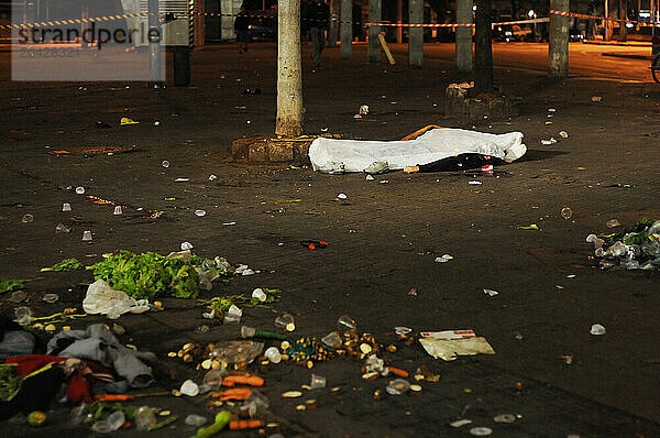 San Paulo is one of the most violent city in the world. Here  a man killed in the city center on issues related to the sale of drugs