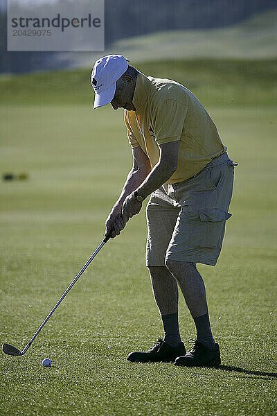 Man plays at a golf course at the Bom Sucesso Resort in Ã“bidos  Portugal