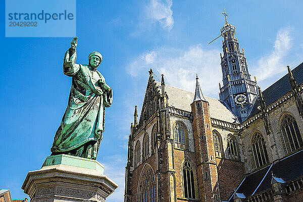 Statue Outside The Saint Bavokerk Church Or Grote Kerk  Haarlem  Netherlands