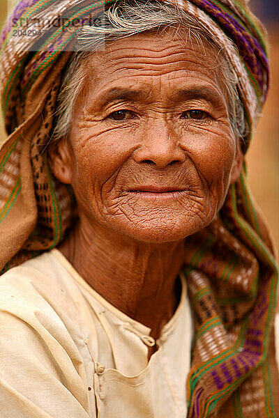 FARMER IN KALOW Burma  female farmer planting rice