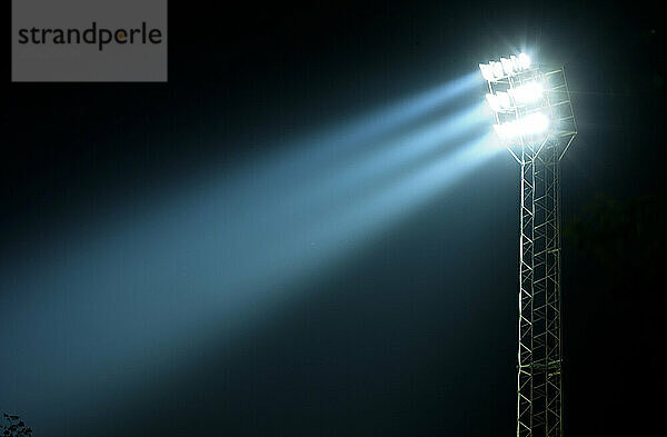 Light beam from station light at Lyngby's stadium in Copenhagen