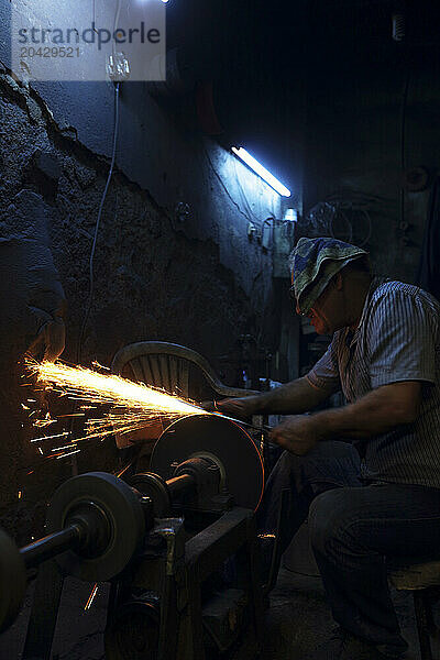 Knife sharpener at work  Gaziantep  Southeastern Anatolia  Turkey