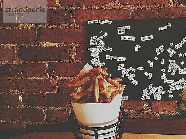 French fries sit on a table at the Duck Fat restaurant in Portland  Maine.