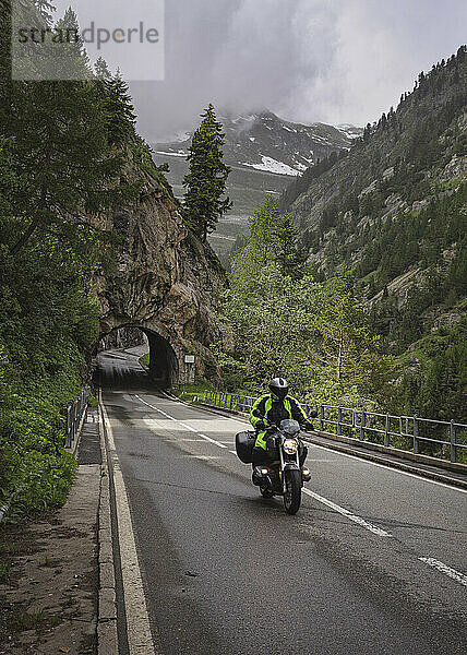 Man riding motorcycle  Aletsch  Vaud  Switzerland