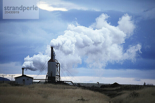 Outlet of steam from a local geothermal power station in Iceland