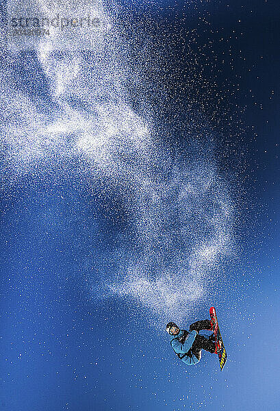 Snowboarder leaping into the air