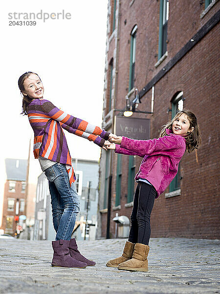 two girls in portland  me's old port