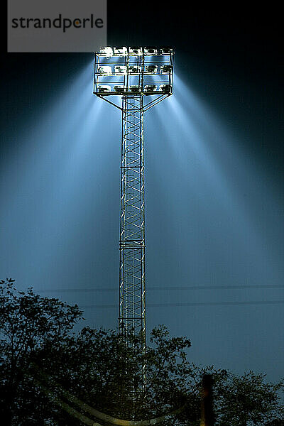 Light beam from station light at Lyngby's stadium in Copenhagen