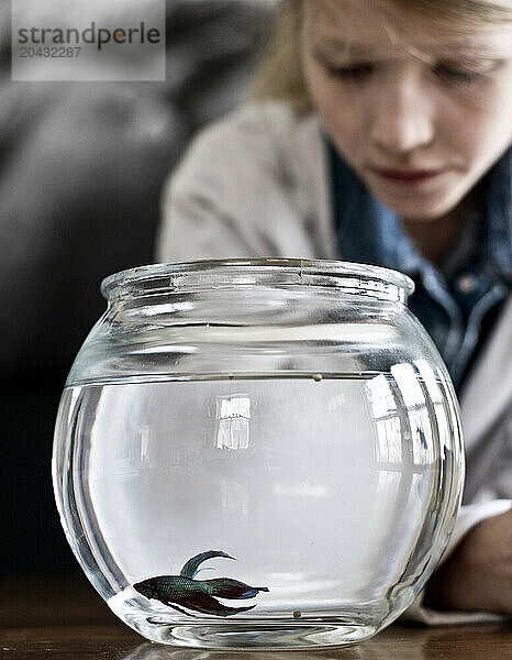 a girl and her fish.