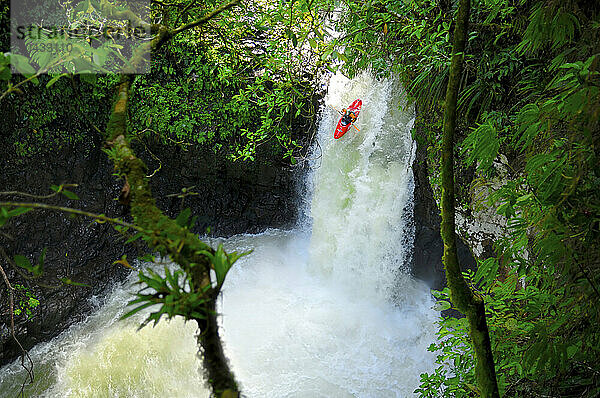 A kayaker takes the plunge on a huge waterfall on the Alseseca River in the Veracruz region of Mexico.