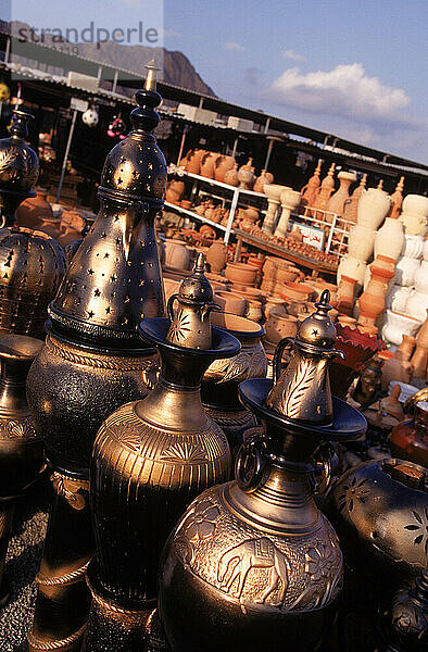 Assorted objects for sale at a market  Dubai  United Arab Emirates.