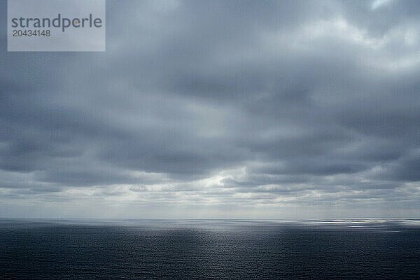 grey clouds hug the coast of Blacks Beach  San Diego  California