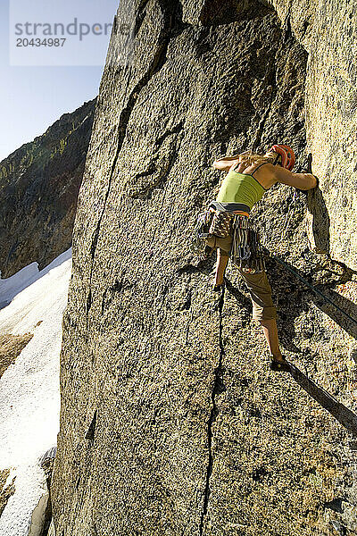 Alpine climber on granite mountains in Washington State