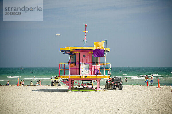 lifeguard on duty looking over the Atlantic Ocean on South Beach  Florida.