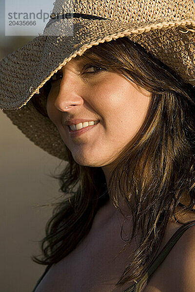 Portrait of a woman on the beach.