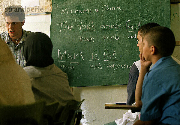 Mark Turner  a graduate from Colorado University  Boulder  teaches UPRMC volunteers English lessons three times at a week at the youth center in Nablus.