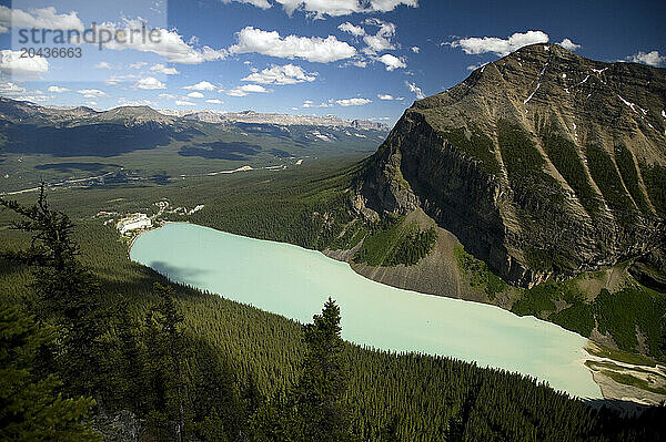 A view from the Beehive high above Lake Louise and the Lake Louise Chateau under cloudy-blue skies in Banff NP  Alberta Canada on 7/24/2010