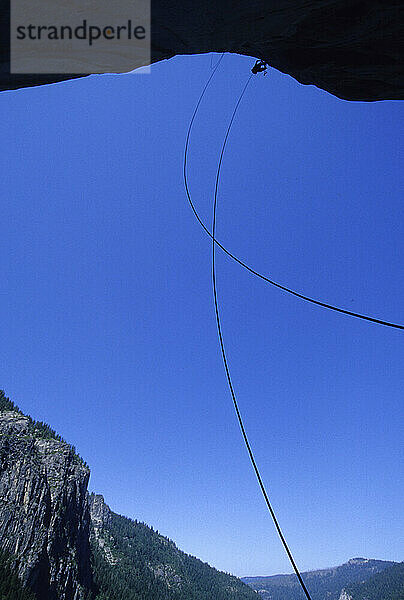 A climber leading an aid route in Yosemite National Park.