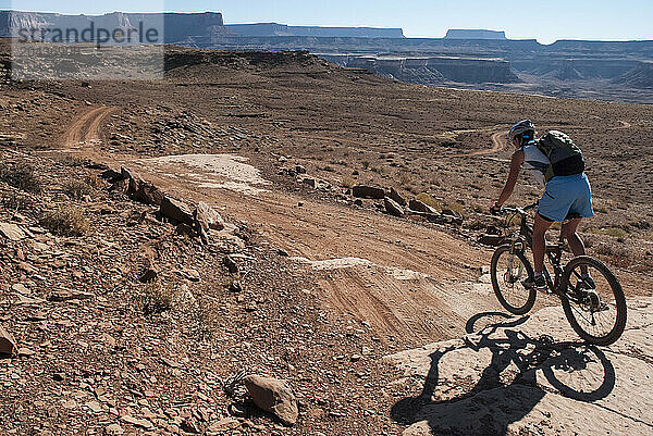 Mountain biking the White Rim Trail near Moab  Utah.