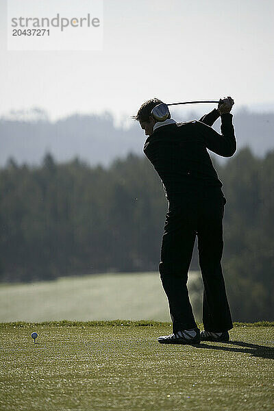 Man plays at a golf course at the Bom Sucesso Resort in Ã“bidos  Portugal