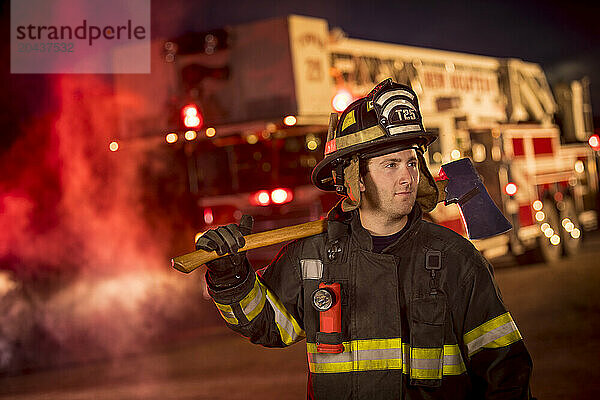 Firefighter with an ax on his back  New Holstein  Wisconsin  USA