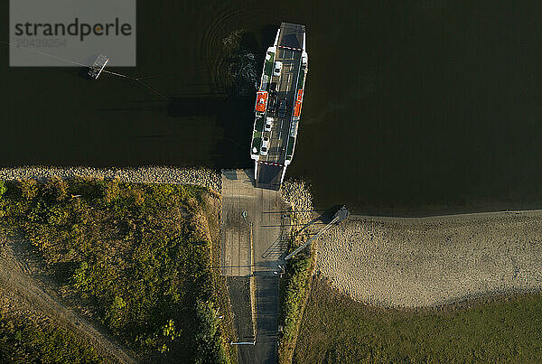 Ferry on river Lek at low levels in period of prolonged drought