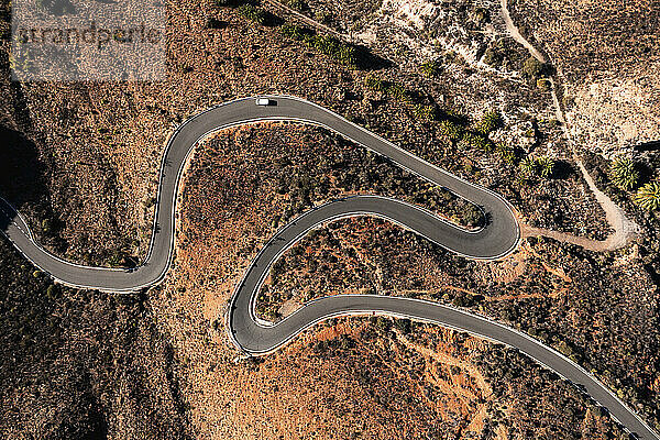 Mountain road leading to Pico de Las Nieves on sunny day in Las Palmas de Gran Canaria  Spain