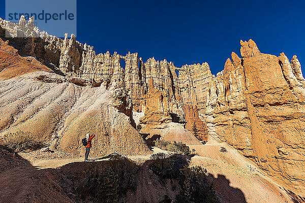 Woman taking pictures in Bryce Canyon National Park