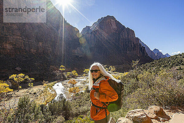 Portrait of woman hiking near Angels Landing Trail overlooking Virgin River