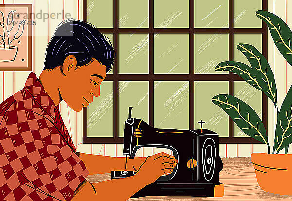 Tailor with sewing machine sitting near table at home