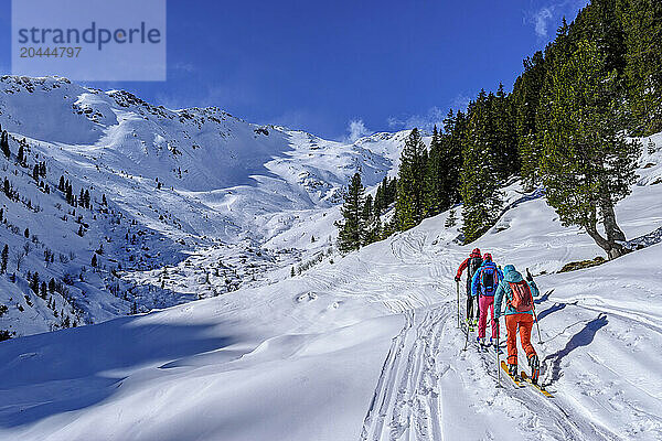 Friends hiking on Karwendel mountains at Tyrol in Austria