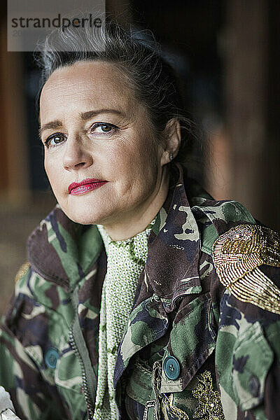 Portrait of Woman Wearing Camouflage Jacket