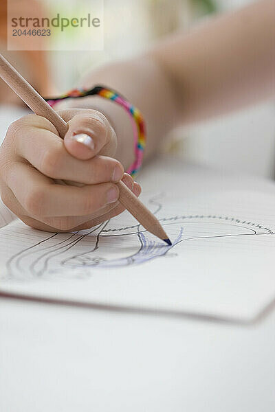 Close up of Girl's Hand Drawing