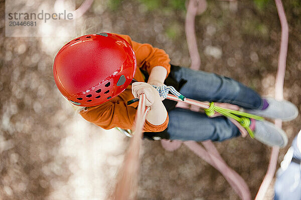 Climber dangling from a rope - high angle