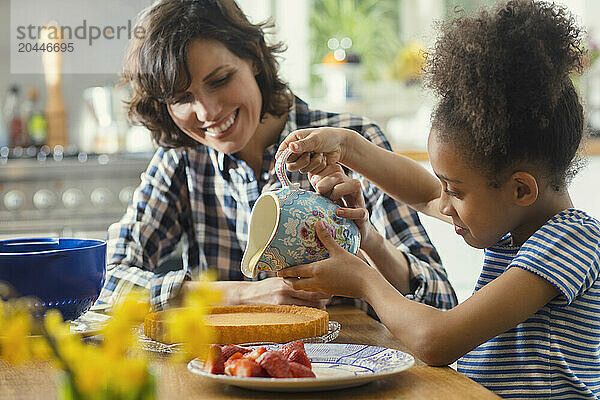 Mother and Daughter Baking Cake