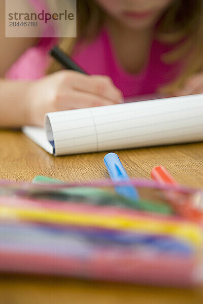 Young Girl Writing