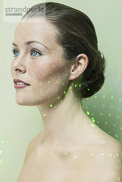 Beauty Portrait of Woman with Laser beam on Face