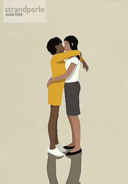 Multiracial lesbian couple hugging and kissing against beige background