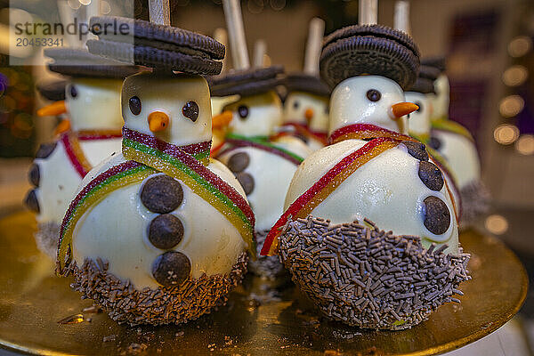 Snowmen on Christmas Market stall in Old Market Square at dusk  Nottingham  Nottinghamshire  England  United Kingdom  Europe