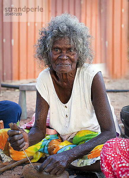 Portrait of a woman  an Aboriginal elder  at Nyinyikay Homeland  East Arnhem Land  Northern Territory  Australia  Pacific